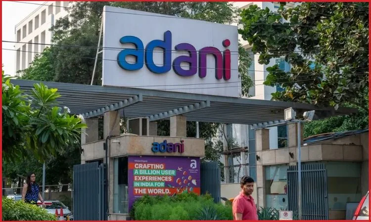 adani group stocks surge